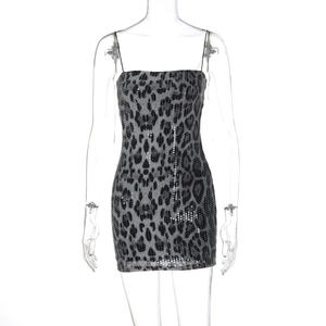 Close-up of leopard print sequins and fine texture on a bodycon mini party dress