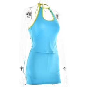 Detail of blue halter neck top and mini skirt set with contrasting yellow trim detail