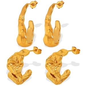 Irregular textured gold lava style C-shaped stud earrings with crinkled metal finish