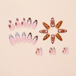 Detailed set of 24 press-on nails with floral prints, zebra stripes and gold beads