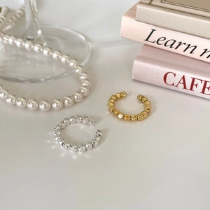 Minimalist geometric beaded ear bone clips in polished gold and silver finishes