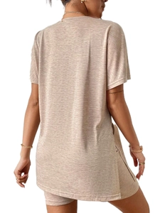 Close-up of beige knit lounge set featuring batwing sleeve top and elastic shorts back