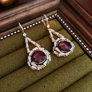 Vintage French-style gold drop earrings with oval red zircon and pavé crystal accents