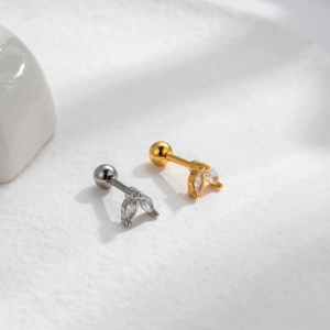 Elegant gold and silver leaf-shaped cartilage stud earrings with sparkling crystals