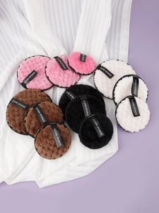 Close-up of soft plush cleansing sponges with Clean Sponge straps and fine texture