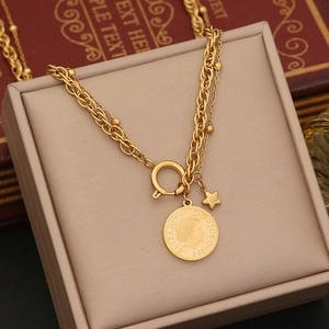 Gold layered stainless steel necklace with Elizabeth II coin and small star pendant