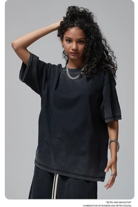 Detail of gray washed vintage oversized cotton T-shirt with soft fabric texture and seams