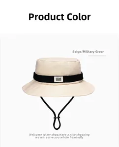 Close-up of beige sun hat detailing woven strap and adjustable black chin cord