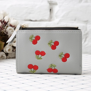 Short grey faux leather wallet with cherry embroidery and secure metal zipper closure