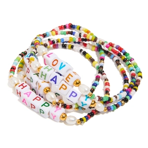 Colorful beaded LOVE HAPPY charm bracelets with seed beads and pearls in stacked style