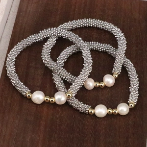 Three-piece handmade beaded bracelet set with silver copper beads and white pearls