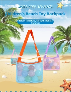 Close-up of durable mesh beach bag with adjustable straps for kids toys and quick-dry sand filtering