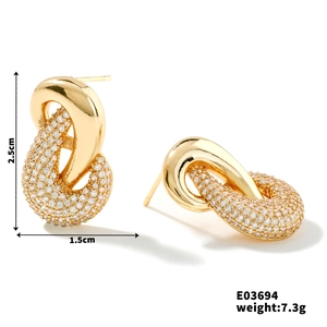 Detailed view of French vintage gold intertwined earrings with cubic zirconia and dimensions