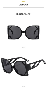 Detailed views of black cat-eye sunglasses with geometric hollow temples and oversized frames