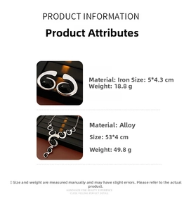 Macro detail of silver geometric jewelry set with black gemstones and specifications
