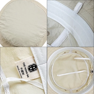 Detailed views of beige quick-dry sun hat showing fabric texture and inner sweatband