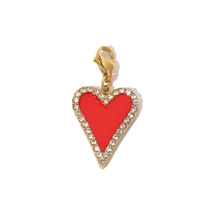 Detailed view of a gold heart pendant with red enamel, crystal border and lobster clasp