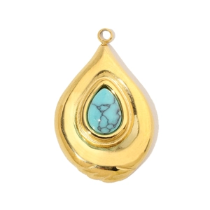 Detail of teardrop turquoise stone pendant in gold plated stainless steel frame
