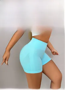 Detail view of sky blue high waist yoga shorts featuring seamless breathable knit texture