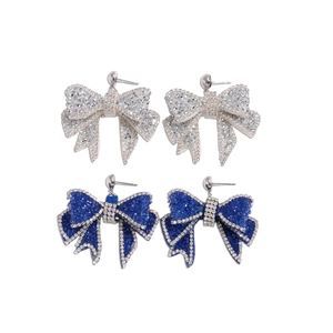 Exquisite silver-tone and navy blue bow-knot stud earrings with sparkling crystals