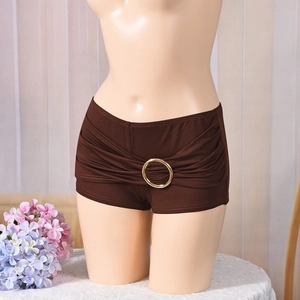 Detail view of brown low-rise hot pants with gold metal ring and pleated fabric design