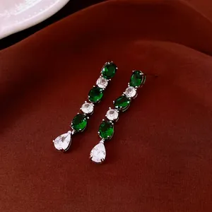 Vintage emerald green teardrop tassel earrings with sparkling crystals for elegant women