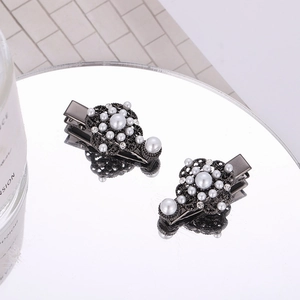 Baroque floral hair clips set with vintage pearls and sparkling rhinestones for women