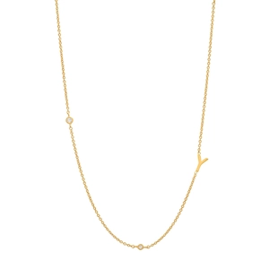Macro detail of gold S925 sterling silver chain with letter Y pendant and small diamonds
