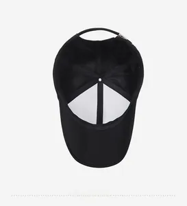 Internal view of the black baseball cap showing reinforced seams and structural lining