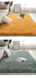 Detail of plush shaggy rug in ginger yellow and cyan colors for cozy bedroom decor