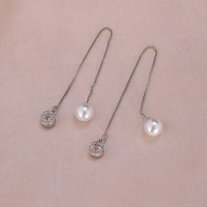 Elegant silver long drop earrings with white pearls and sparkling round zircon stones