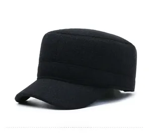 Detail view of winter flat top cap with wool texture and metallic SPORT emblem