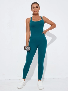 Detail of teal seamless yoga jumpsuit with slim fit and elastic sleeveless design