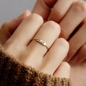Golden S925 sterling silver ring with engraved Fuck it text in elegant cursive script