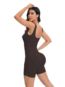 Detail of ribbed knit fabric on a seamless dark brown athletic bodysuit romper