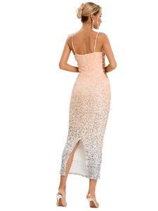 Detail of pink gradient sequins on backless evening dress with thin straps and a back slit