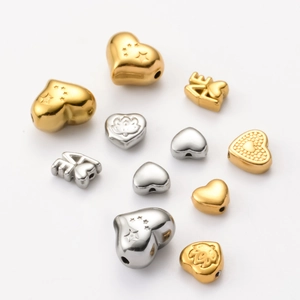 Baroque style stainless steel heart and LOVE letter spacer beads in gold and silver