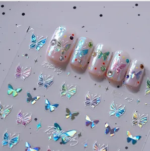 Macro detail of laser iridescent butterfly nail stickers with 3D embossed texture