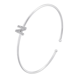 Detailed view of silver open cuff bracelet with micro-paved cubic zirconia letter N charm
