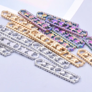 Polished stainless steel heart and star connector chains in silver, gold, and rainbow colors