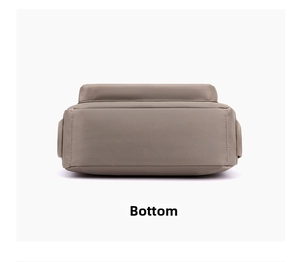 Flat bottom view of khaki waterproof nylon crossbody bag showing neat stitching and quality