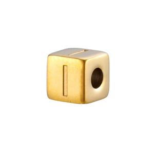 Macro view of a 14K gold-plated stainless steel cube bead with engraved letter I