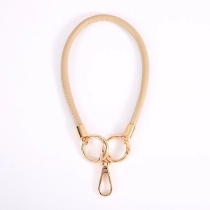 Minimalist beige leather rope keychain with premium gold metal lobster clasp and ring