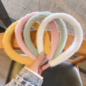 Collection of plush headbands in yellow pink mint and white soft faux fur textures