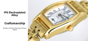 Detail of tonneau-shaped gold watch with Roman numerals and IPG plated alloy strap