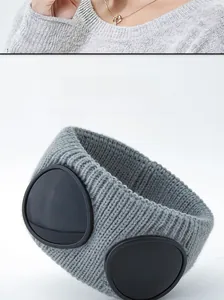 Close-up of grey knit ear warmer headband with integrated black goggles detail