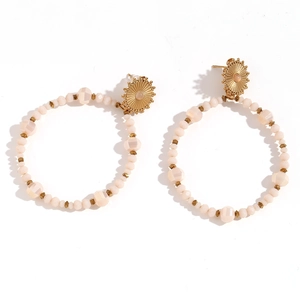 Bohemian large hoop earrings with light pink faceted crystal beads and gold sunflower studs