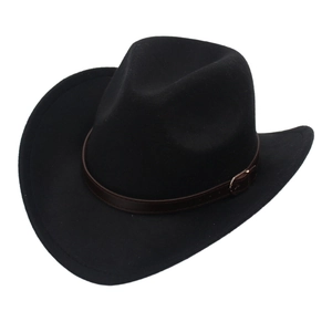 Detail of black cowboy hat with brown leather band and golden metal buckle decoration