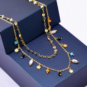 Double-layered 18k gold plated titanium necklace with star charms and colorful beads