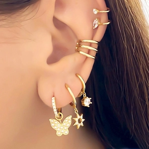 Golden S925 silver hoop earrings set featuring butterfly, star pendants and ear cuffs